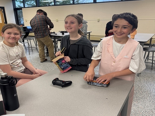 Middle school students working on their battle boxes