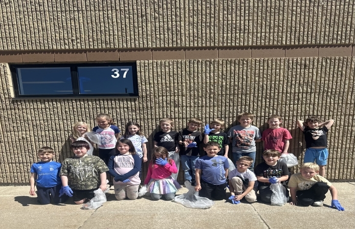 2nd grade class cleaned the elementary grounds on Earth Day