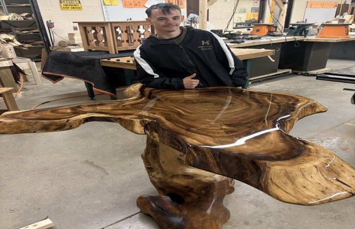 MITES Regional 2nd place winner, Jacob Coltson displaying his woodshop project